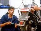 Women mechanics of Madras. Click for a bigger image