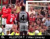 Mario Basler scores of a free kick