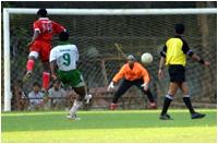 No.9 (Dyanand) takes a shot at Mahindra's goal