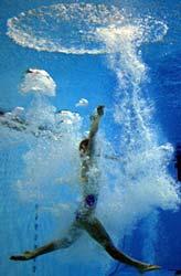 Irina Lashko rises to the top of the pool after her dive.